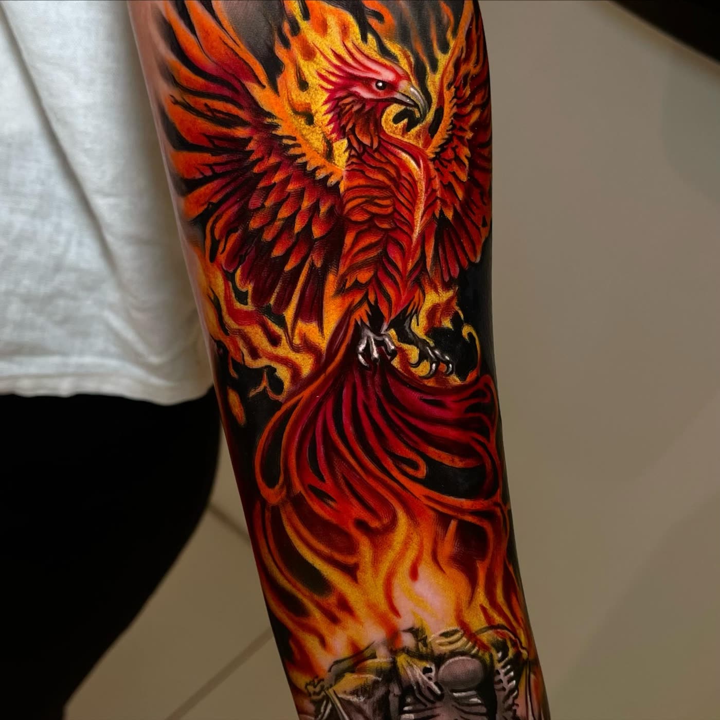Phoenix rising color tattoo by Christian Silva